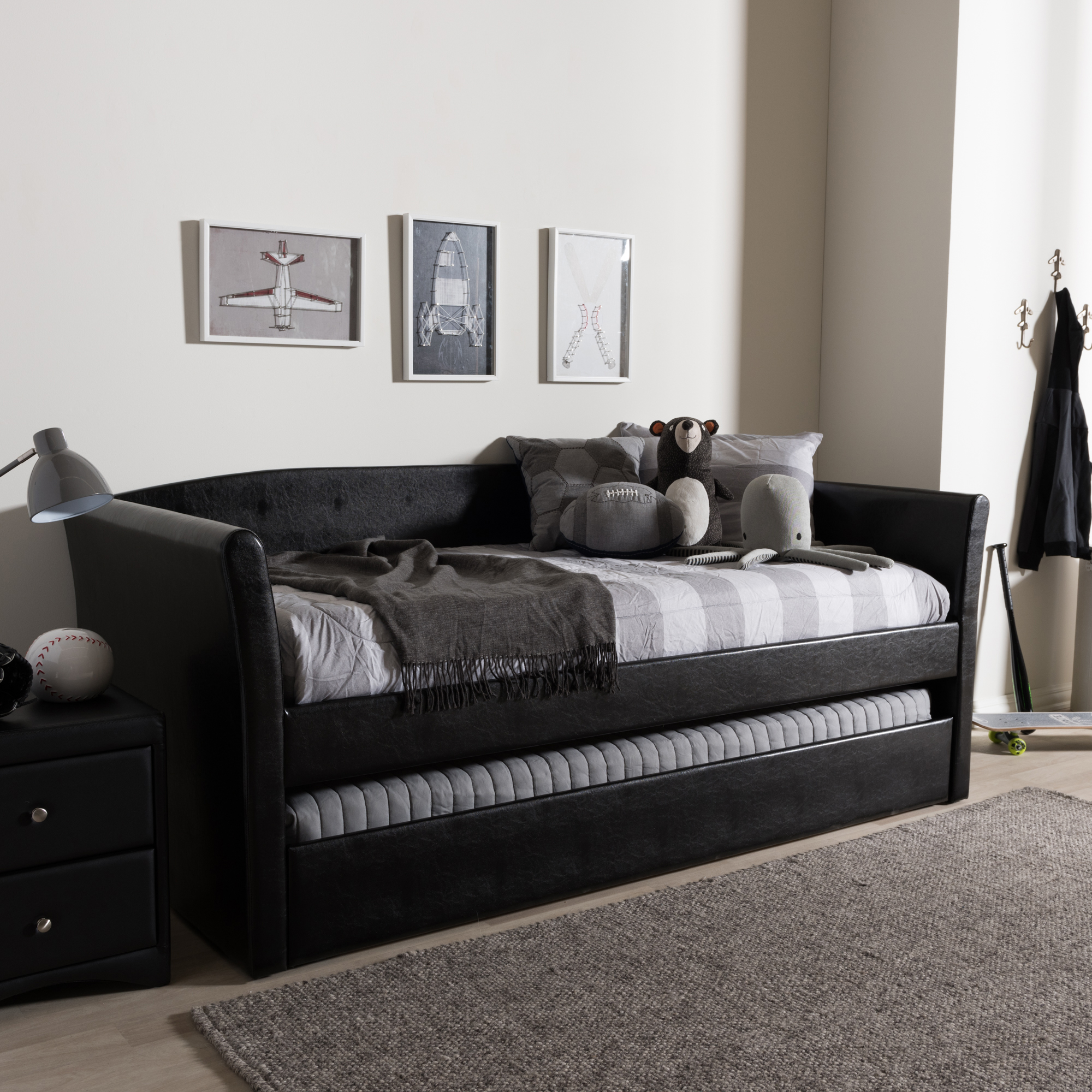 Black leather store daybed with trundle